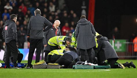 Premier League soccer match abandoned after player collapses on field